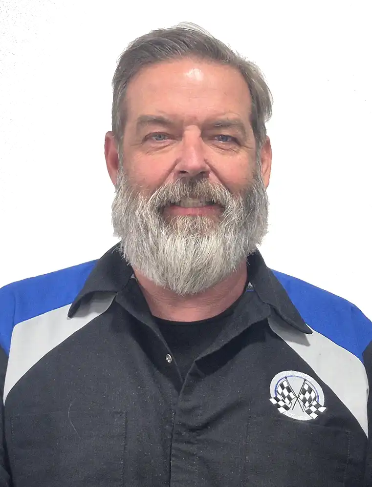 Don Marshall, owner, in a Town Center Auto Repair work shirt